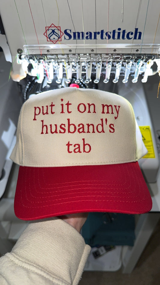 put it on my husband’s tab trucker hat